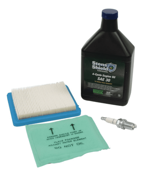 A bottle of oil, air filter and spark plug.