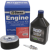 A set of engine maintenance items including an oil filter, spark plug and motor oil.